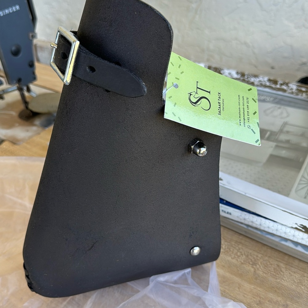 New in packaging black stirrup tapaderos